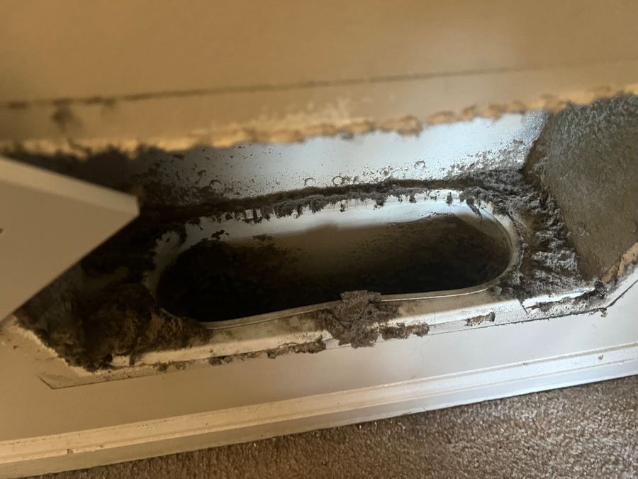 Dusty duct interior before cleaning